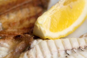 Fried fish with a lemon