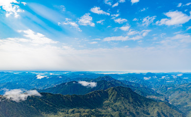 Clouds float over the mountians