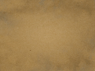 Fototapeta na wymiar Dirty cardboard background. Brown paper texture