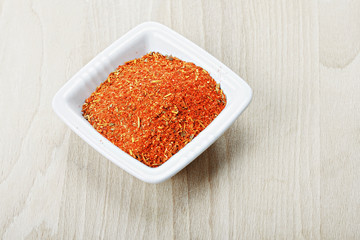Red spice mixture for fish courses on wood