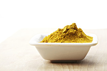 Khmeli suneli spice mixture on wood