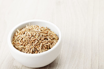 Caraway spice seeds in cup
