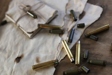 bullet and retro paper on the table