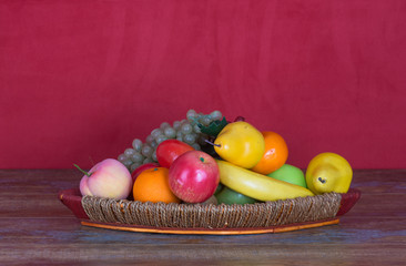 artificial fruits in a basket for the interior