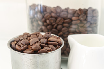 Roasted Coffee Beans / Roasted Coffee Beans In Cup Scattered Isolated On White.
