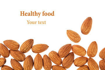 Nuts border of almonds on white background. Pile of selected almond close-up. Isolated.  For vegetarians.