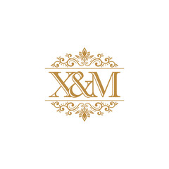 X&M Initial logo. Ornament gold