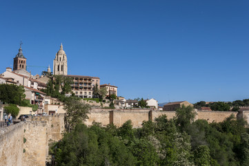 Fototapeta na wymiar Views of the city of Segovia, with the Cathedral and the Church of Saint Andrew in the background, in Segovia, Spain on May 16, 2015.