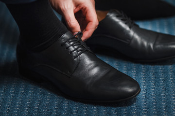 Men's Classic Black Leather Shoes on the floor