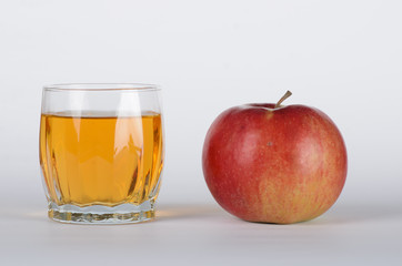 Apple with glass of juice 