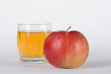 Apple with glass of juice 