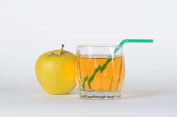 Apple with glass of juice 