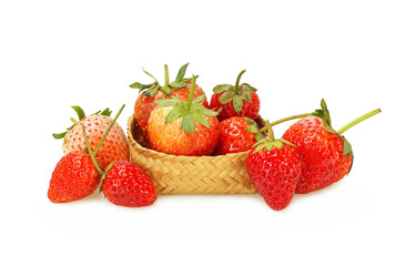 Fresh strawberries in a basket on white background