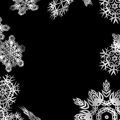 Winter frame with snowflakes on black background.