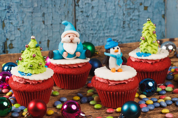 Christmas cupcakes with colored decorations