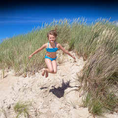 young girl jumping