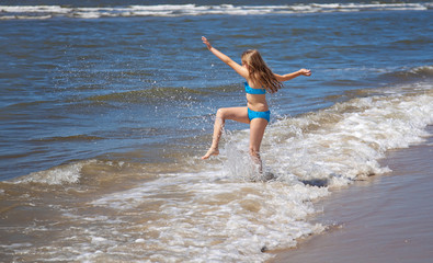young girl on a beach