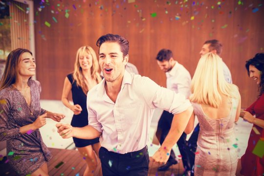 Composite image of young friends having fun at party