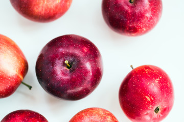 Fresh red apple on a white background