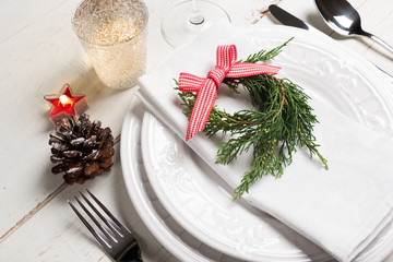 Christmas table setting with little wreath
