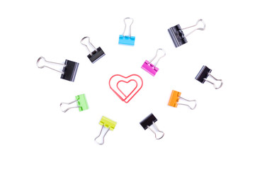Heart paperclip in center surround with multicolored paperclip b