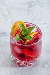 cranberry cocktail with ice and mint