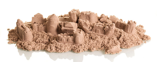Sand Castles destroyed isolated on white.