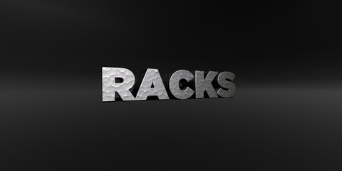 RACKS - hammered metal finish text on black studio - 3D rendered royalty free stock photo. This image can be used for an online website banner ad or a print postcard.