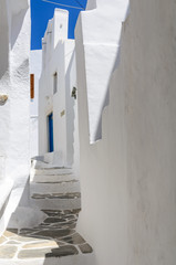 Traditional cycladic whitewashed street, Sifnos, Cyclades, Greec © masquerade75