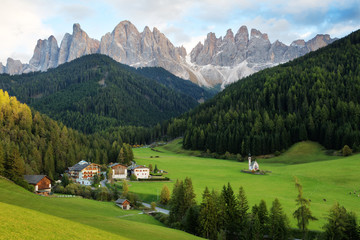 Santa Maddalena village in front of the Geisler or Odle Dolomites Group , Val di Funes, Italy, Europe.