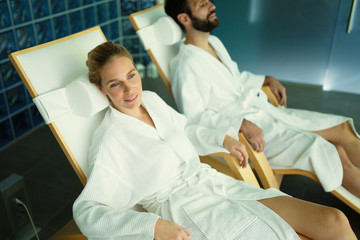 Couple relaxing in spa center