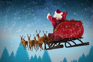 Composite image of santa claus riding on sleigh during christmas