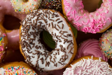 Tasty doughnuts with sprinkles