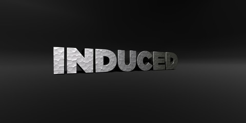 INDUCED - hammered metal finish text on black studio - 3D rendered royalty free stock photo. This image can be used for an online website banner ad or a print postcard.