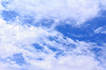 Fototapeta premium Blue sky background with white clouds. The vast blue sky and clouds sky on sunny day. White fluffy clouds in the blue sky.