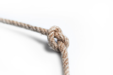 Rope with knot isolated over white background
