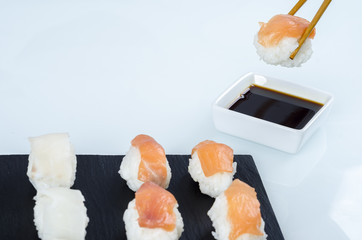 Sushi nigiri set on slate plate.