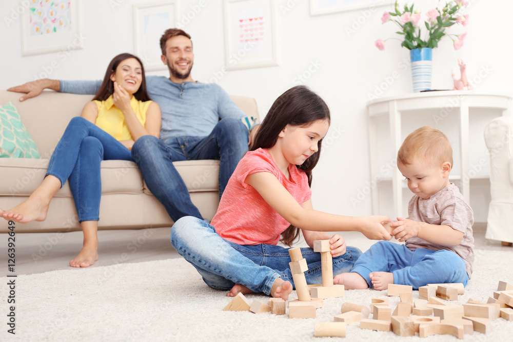 Poster cute kids playing games at home