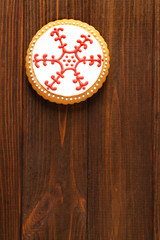 Obraz na płótnie Canvas Tasty Christmas tasty cookie on wooden background