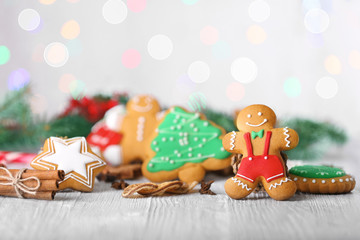 Tasty Christmas cookies on wooden table, close up view