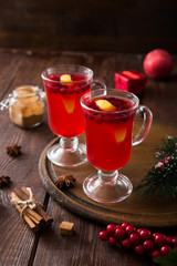 Christmas card. hot spicy Christmas drink of cranberry and spice