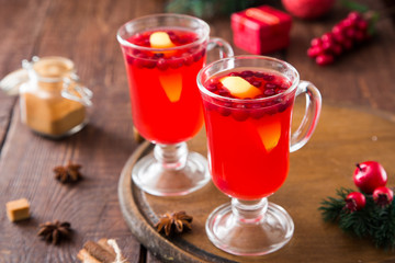 Christmas card. hot spicy Christmas drink of cranberry and spice