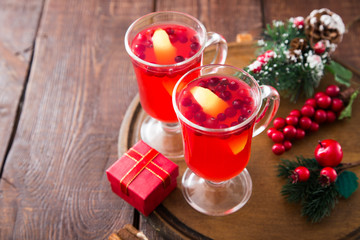 Christmas card. hot spicy Christmas drink of cranberry and spice