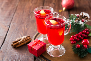 Christmas card. hot spicy Christmas drink of cranberry and spice