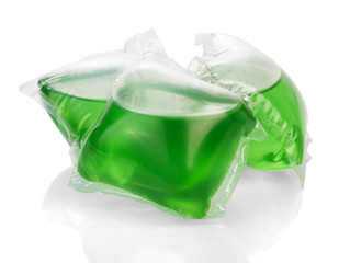 Green gel for washing capsules isolated on white.