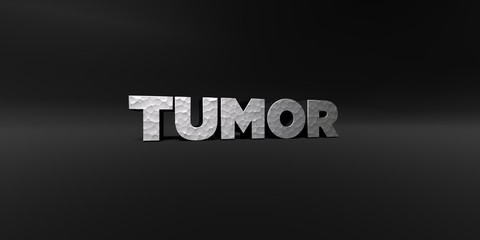 TUMOR - hammered metal finish text on black studio - 3D rendered royalty free stock photo. This image can be used for an online website banner ad or a print postcard.