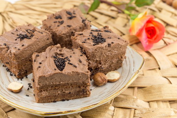 Hazelnut cake covered with chocolate cream