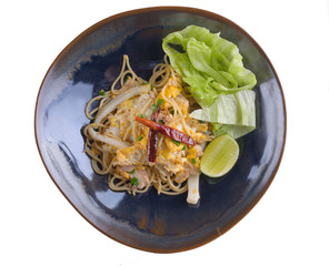 spaghetti with squid in plate on white background