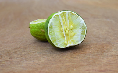 Dried lime / lemon on wooden background