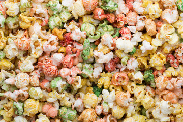 Colored Popcorn texture background. Sweet popcorn.